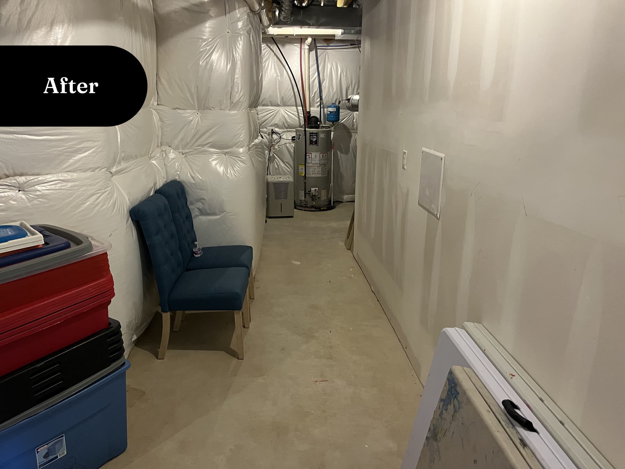 Same back room from the side, floor cleared and items organized, after transformation